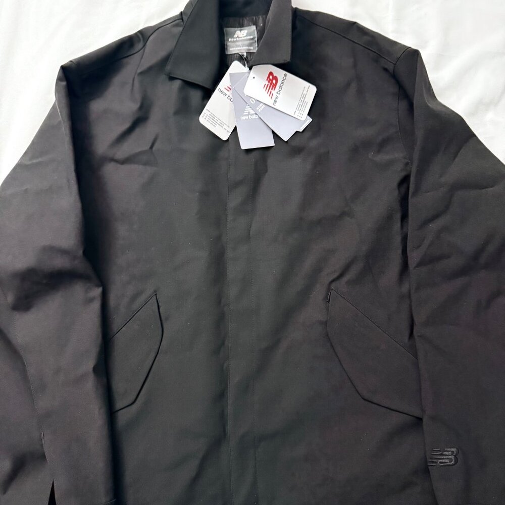 Men’s New Balance jacket, brand new with original tags.